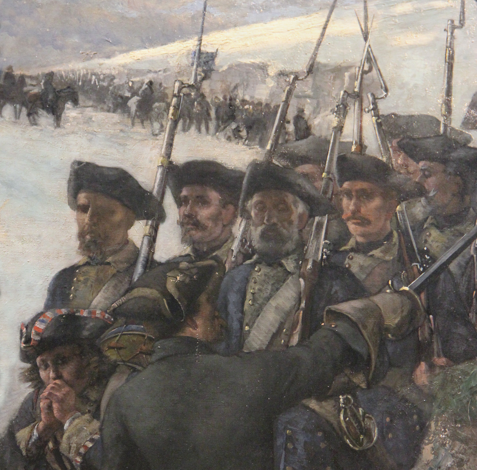 Karoliner på marsch i ett vinterlandskap.
