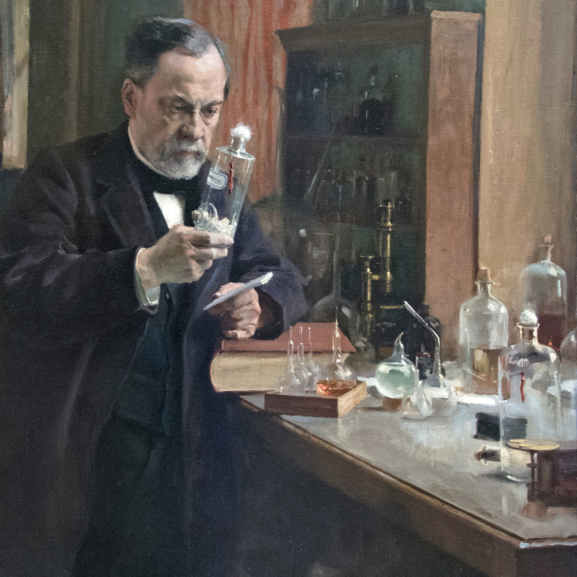 Louis Pasteur i kosntym, håller upp ett provrör som han tycks granska noga. Interiören föreställer hans labb.