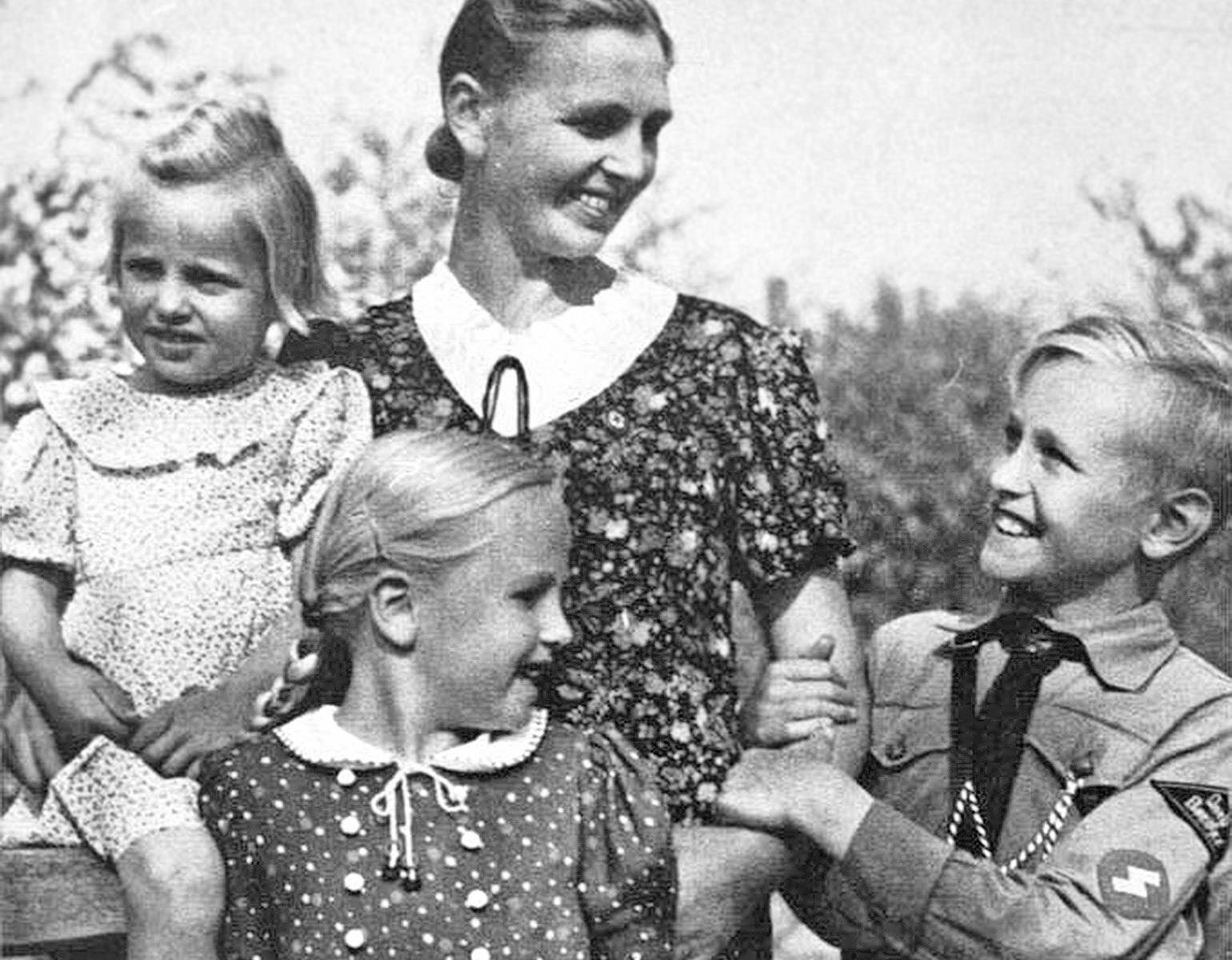 Kvinna med tre barn