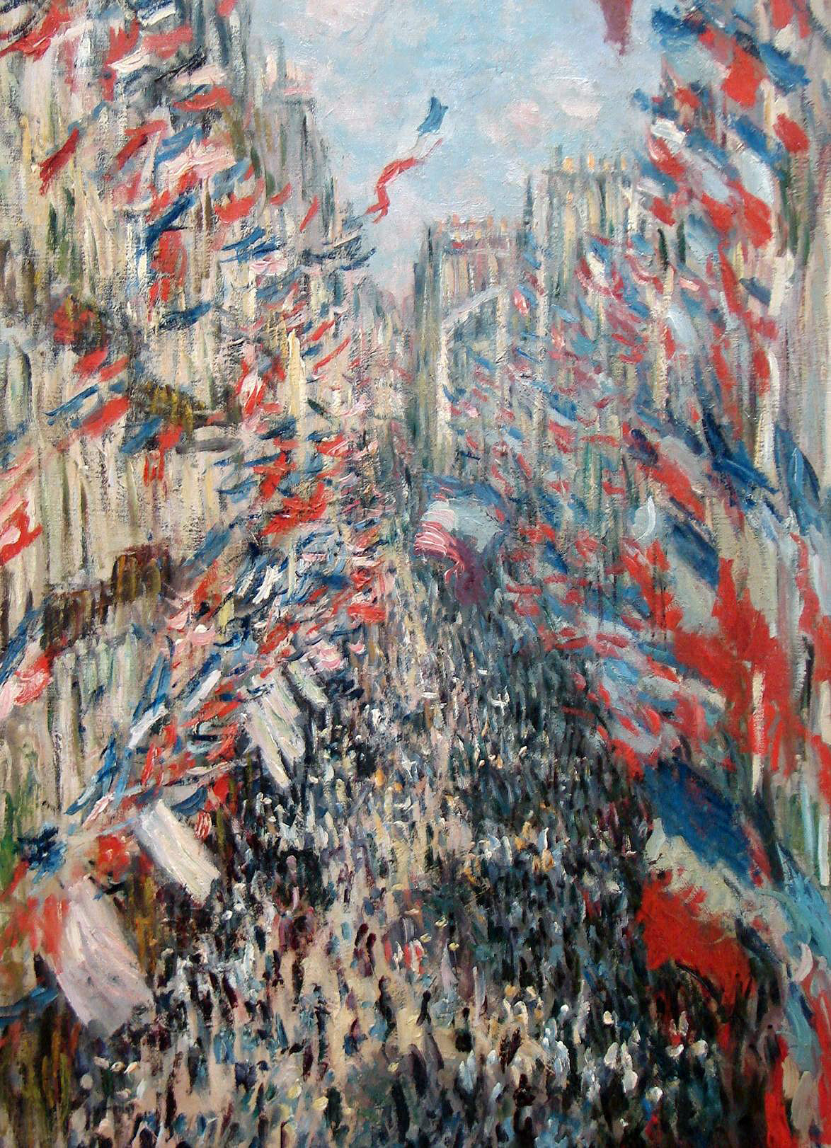 Gata med massor av franska flaggor i Paris.