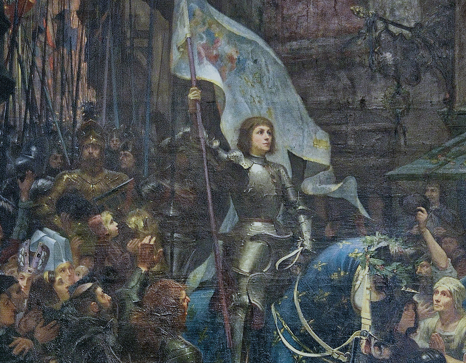 Jean mottar folkets jubel på en häst på en gata i Orleans.