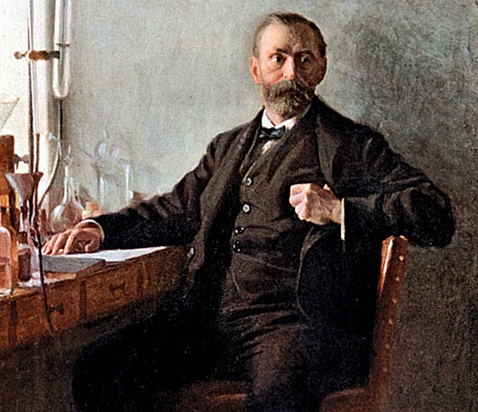 Alfred Nobel som sitter på en stol